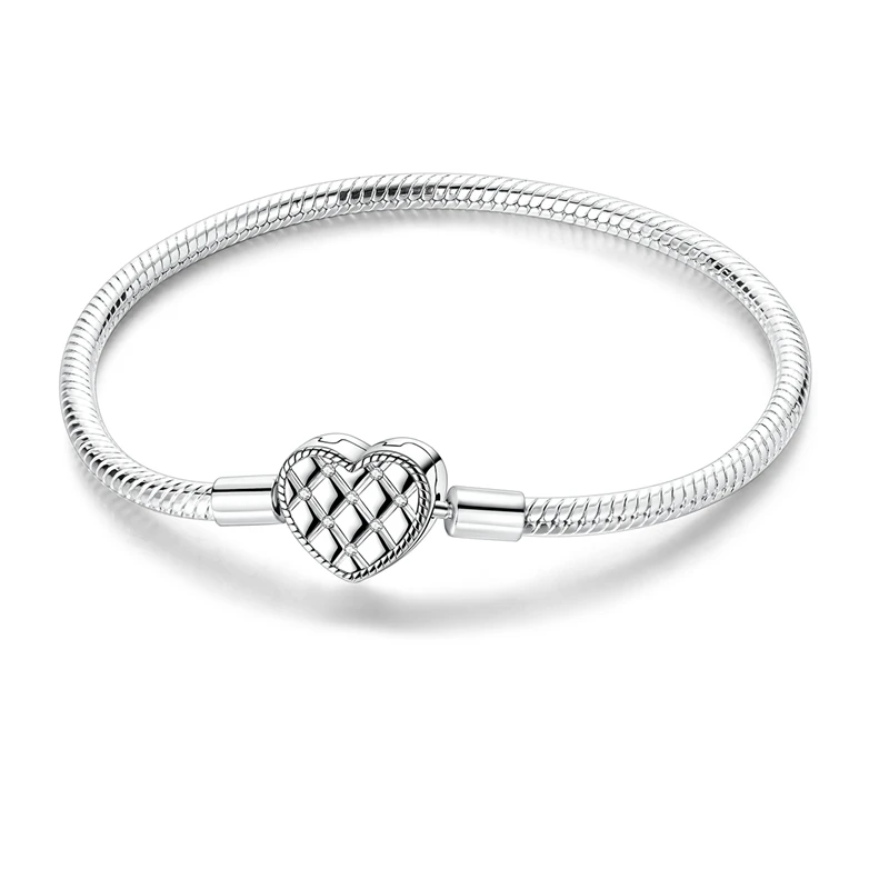 Pulseira de prata com fecho coração acolchoado cravejado de zircónias.