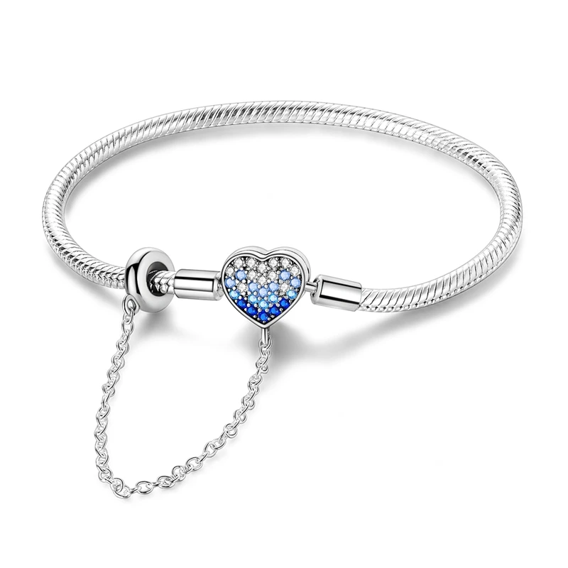 Pulseira de prata com fecho de coração em degradê azul e zircónias transparentes.