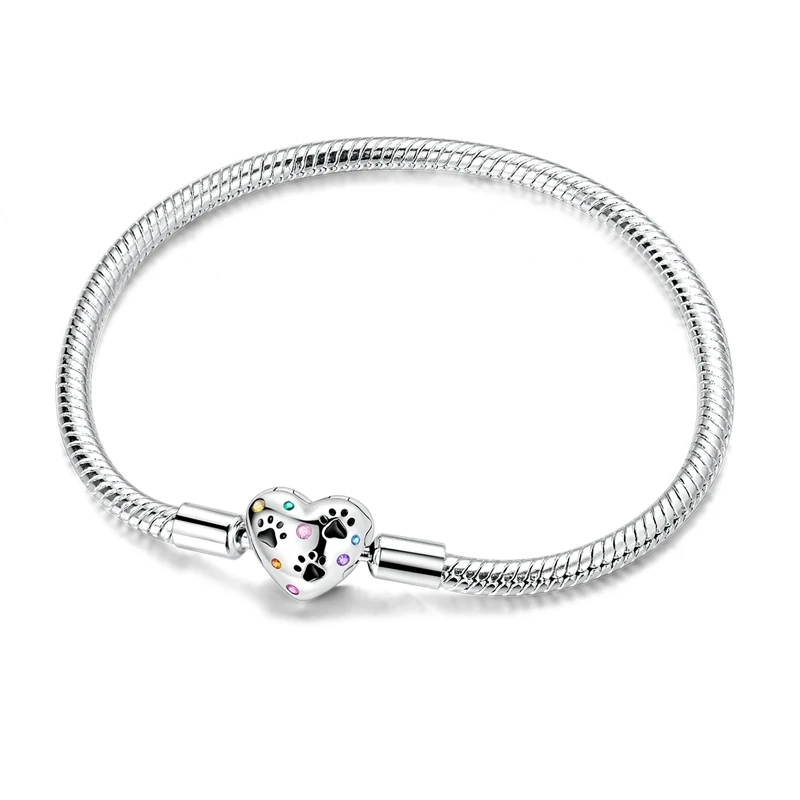 Pulseira em prata com fecho coração e patas de gato e zircónias coloridas.