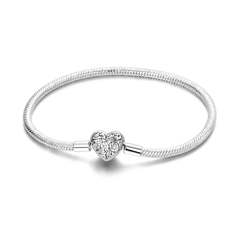Pulseira de prata 925 com fecho de coração rendado e zircónias brilhantes.