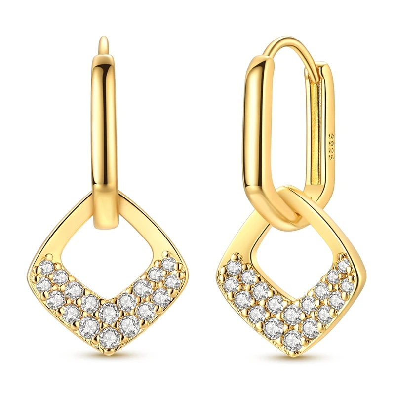 Brincos pendentes em forma de losango com acabamento dourado e incrustações de zircónias.