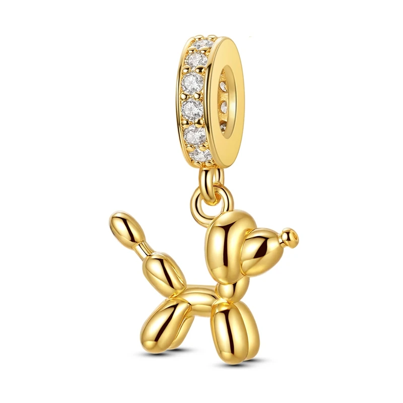 Berloque pendente dourado em formato de cão balão, com zircónia, em prata.