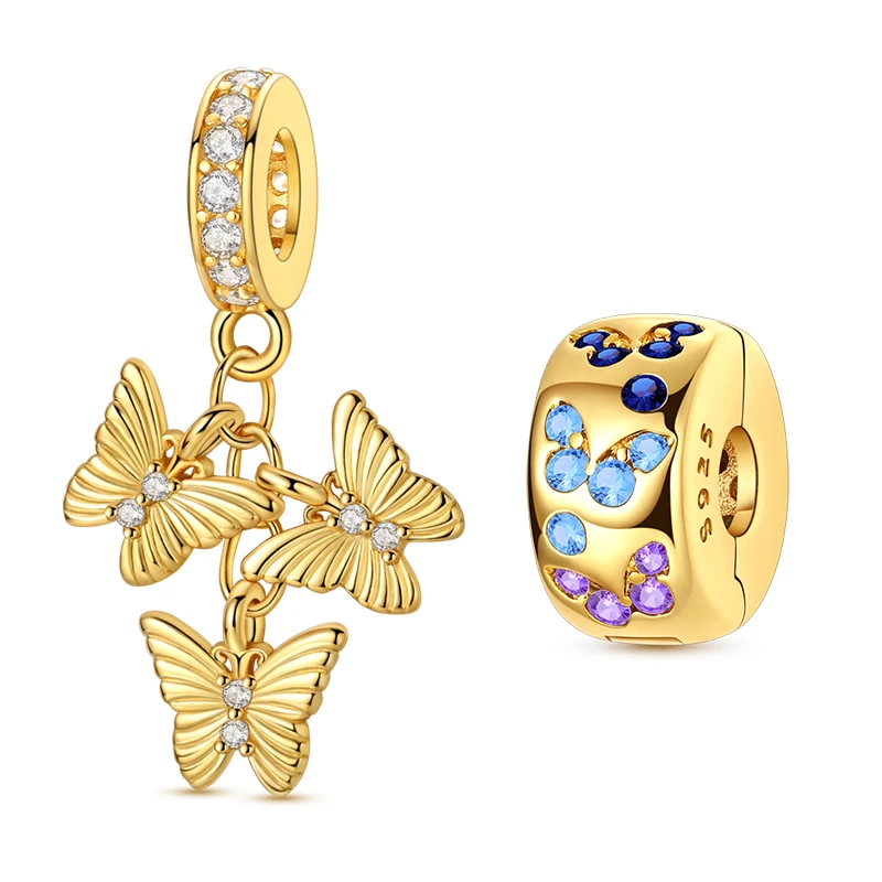 Berloque com três borboletas pendentes em dourado e clipe separador com zircônias coloridas