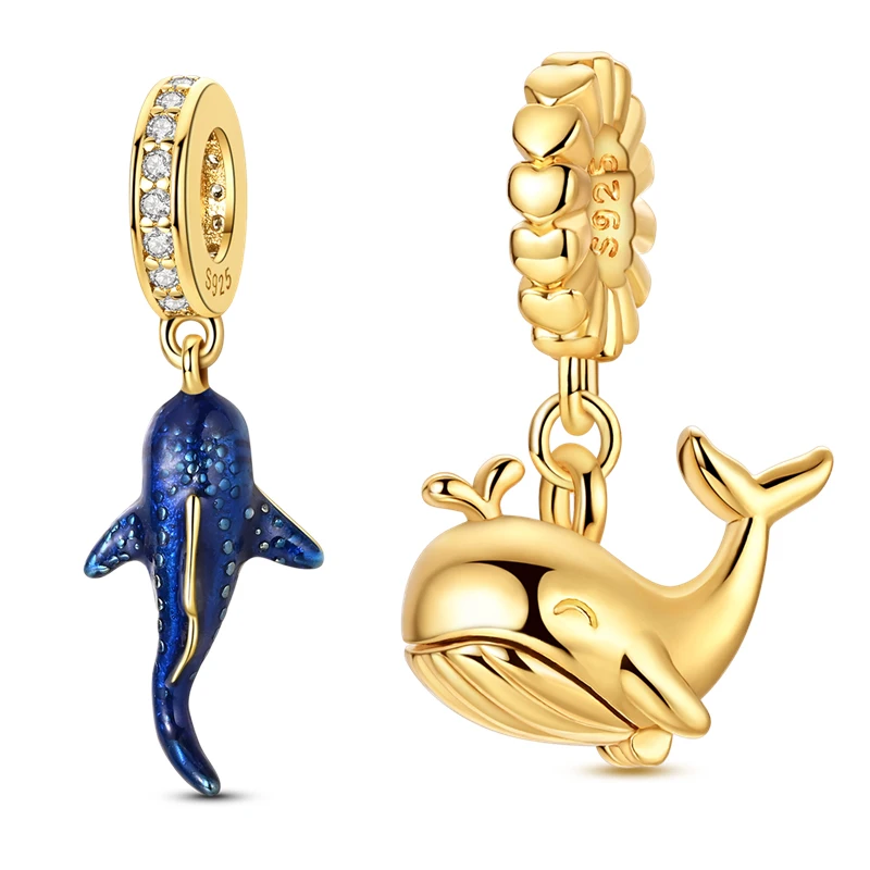 Pingentes de prata com zircónia: tubarão-baleia azul e baleia dourada.