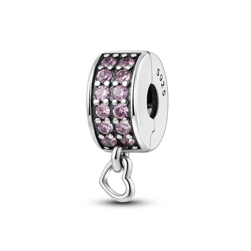 Clip charm de prata 925 com duas fileiras de zircónias rosadas e pequeno coração pendurado.