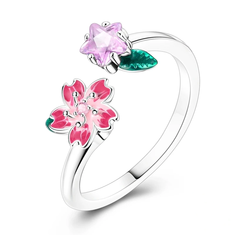 Anel ajustável em prata com flor de cerejeira esmaltada e cristal rosa em forma de estrela