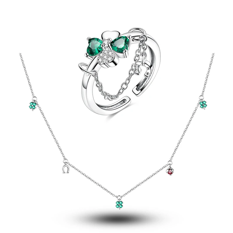 Conjunto de joias em prata com trevo de quatro folhas verde, ferradura e joaninha