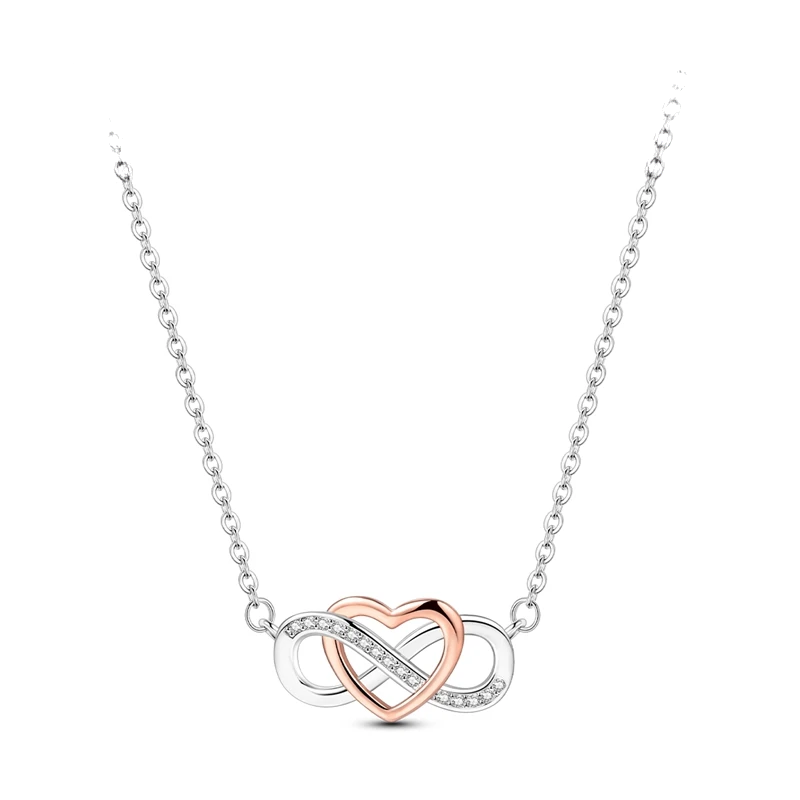Colar em prata com pendente de coração em ouro rosa e símbolo de infinito cravejado de zircónias.