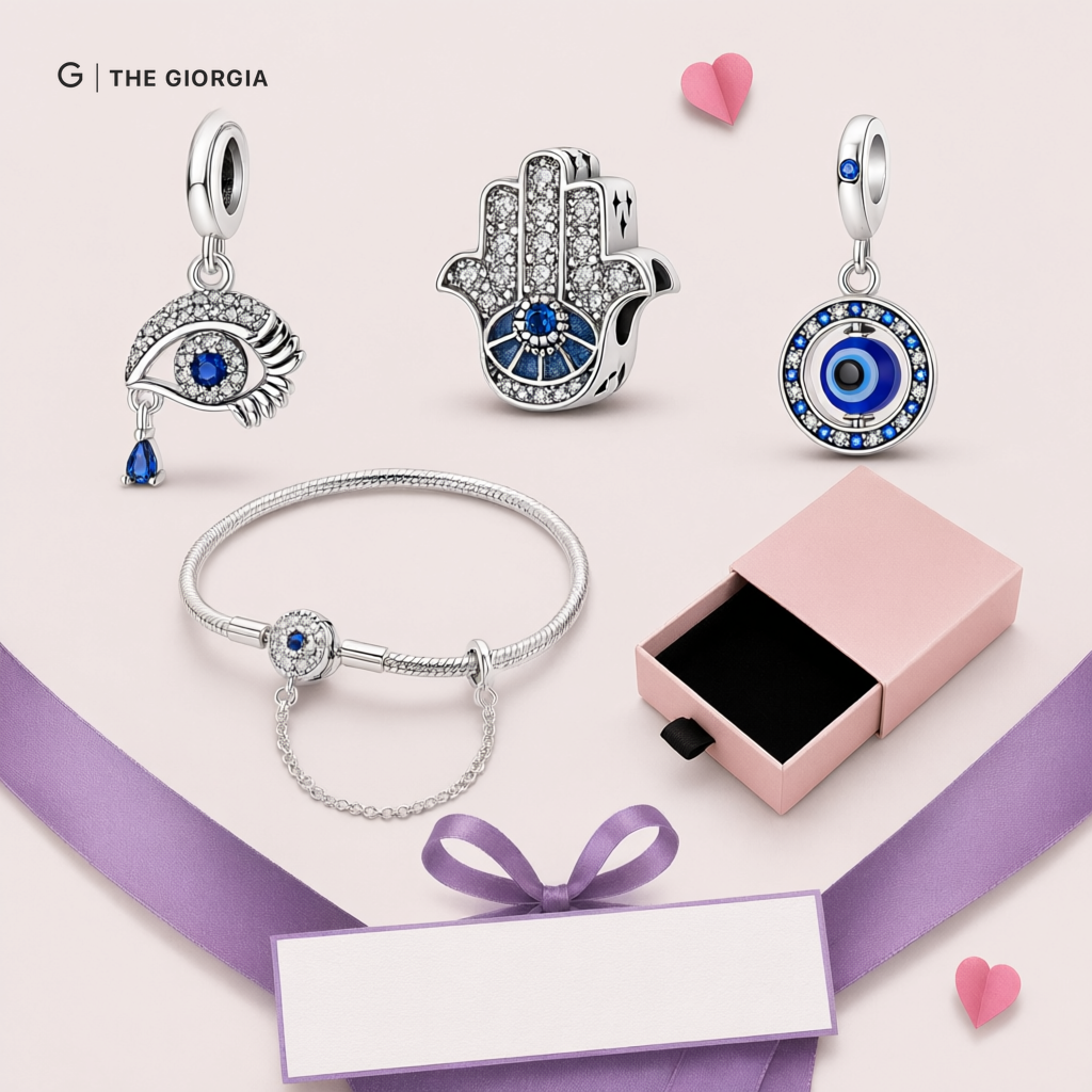 Pulseira de prata com berloques Mão de Hamsá e Olho Grego com detalhes em azul