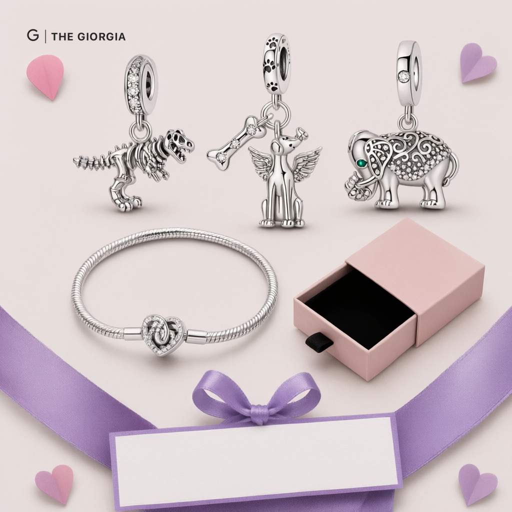 Pulseira prata com berloques de coração, cão alado e elefante, com zircónias rosadas