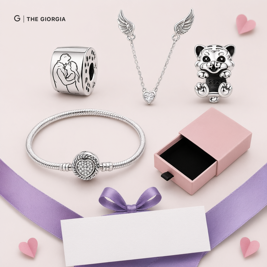 Pulseira prata com berloques de coração, unicórnio e asas de anjo cravejados de zircónias