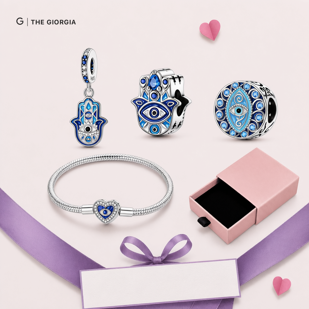 Pulseira de prata com berloques Mão de Fátima e Olho Grego com zircónias