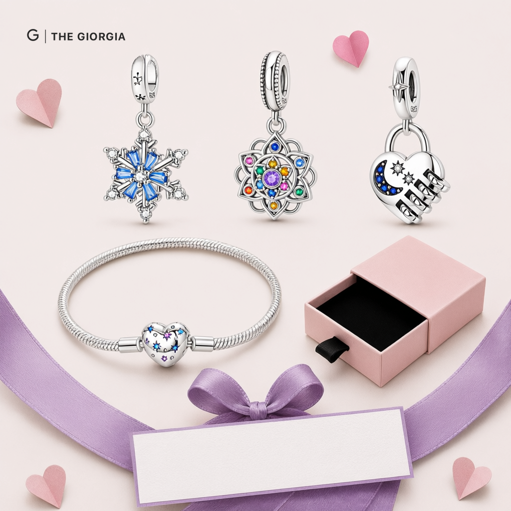 Pulseira em prata com berloques de coração rosa, árvore da vida e infinito, com fecho de Nossa Senhora