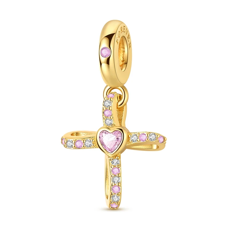 Pingente em forma de cruz dourada curvada com coração rosa central cravejado de zircónias