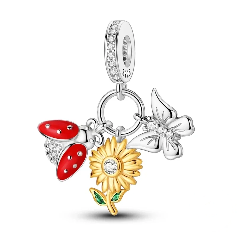 Charm em prata com pendente de joaninha vermelha, girassol dourado e borboleta prateada com zircónias