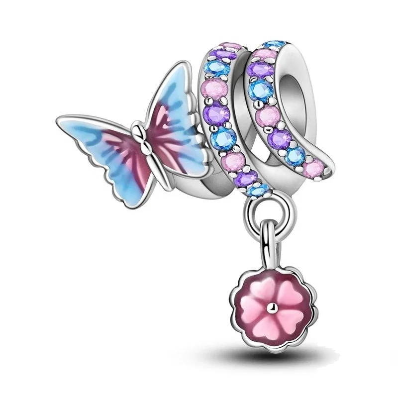 Conta de prata com borboleta esmaltada em tons de azul e rosa, com uma pequena flor rosa pendente e detalhes em zircónia.