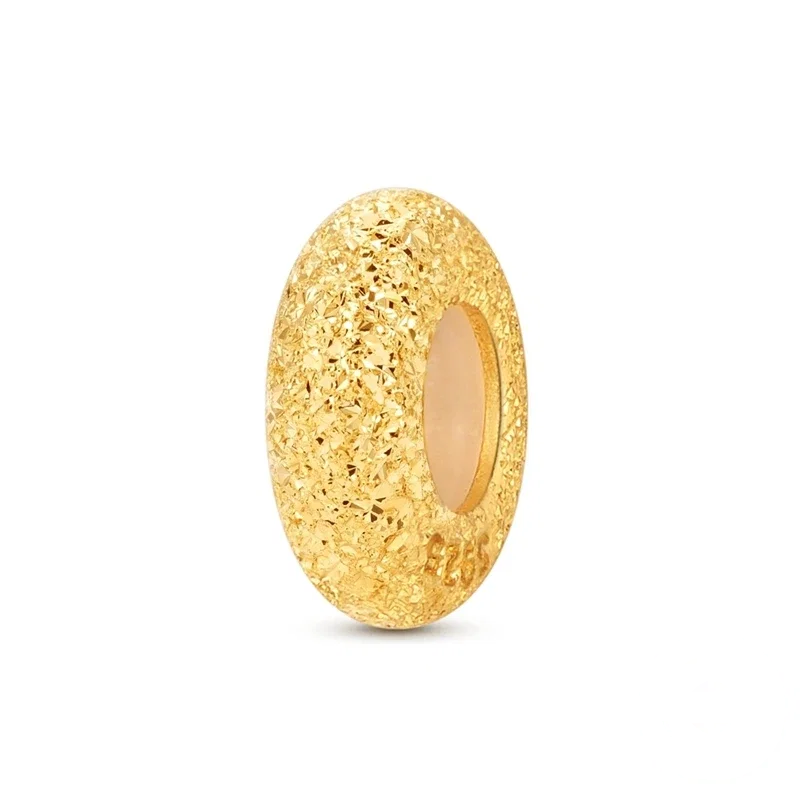 Conta espaçadora arredondada em prata com textura diamantada cintilante, em tom dourado
