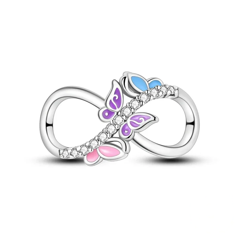 Charm em prata com símbolo do infinito cravejado de zircónias e borboletas em esmalte pastel